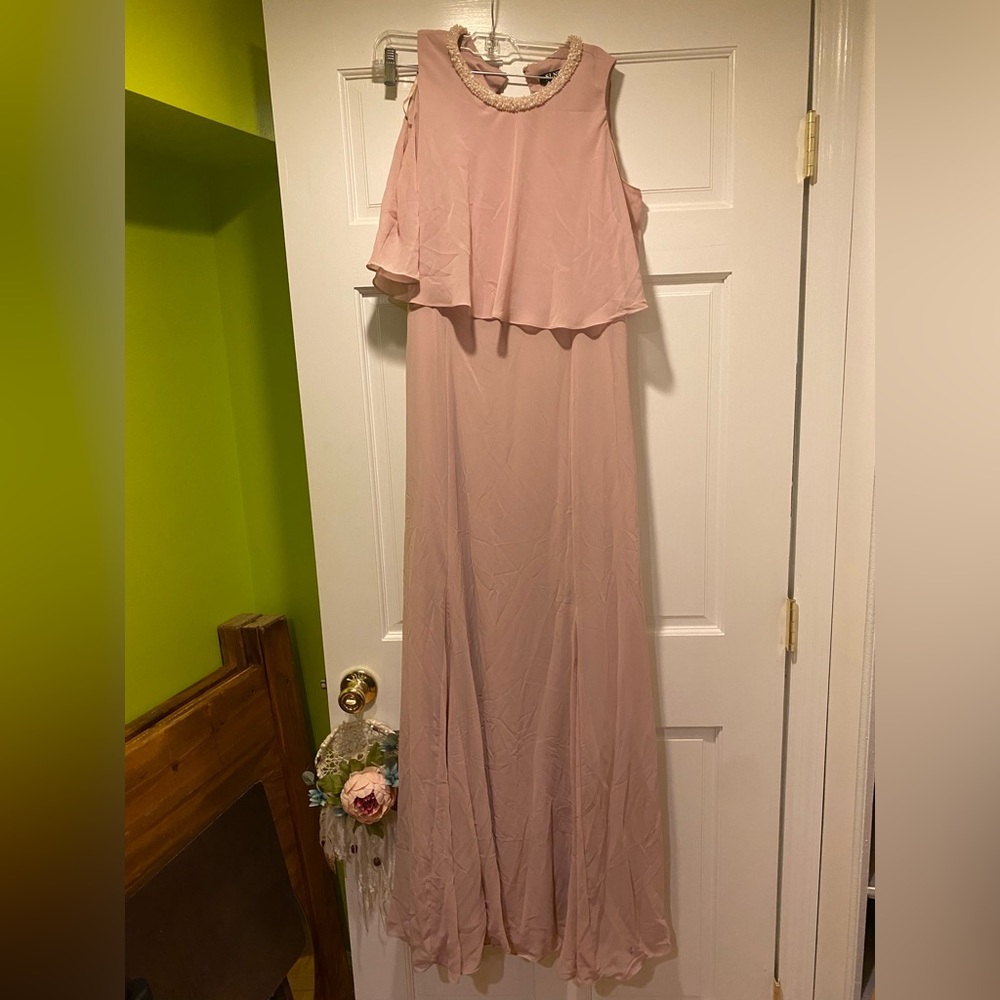 Worn once to a wedding has stain on the bottom